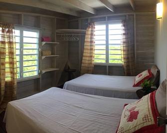 Grace Inn: 2 Bedrooms, Naturally Cooled In A Quiet Smart Communitycertified - Osbourn - Sypialnia