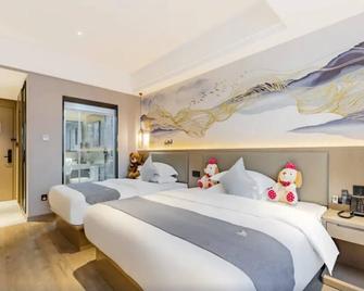 Greentree Eastern Hotel Chizhou Tonghui Plaza - Chizhou - Ložnice