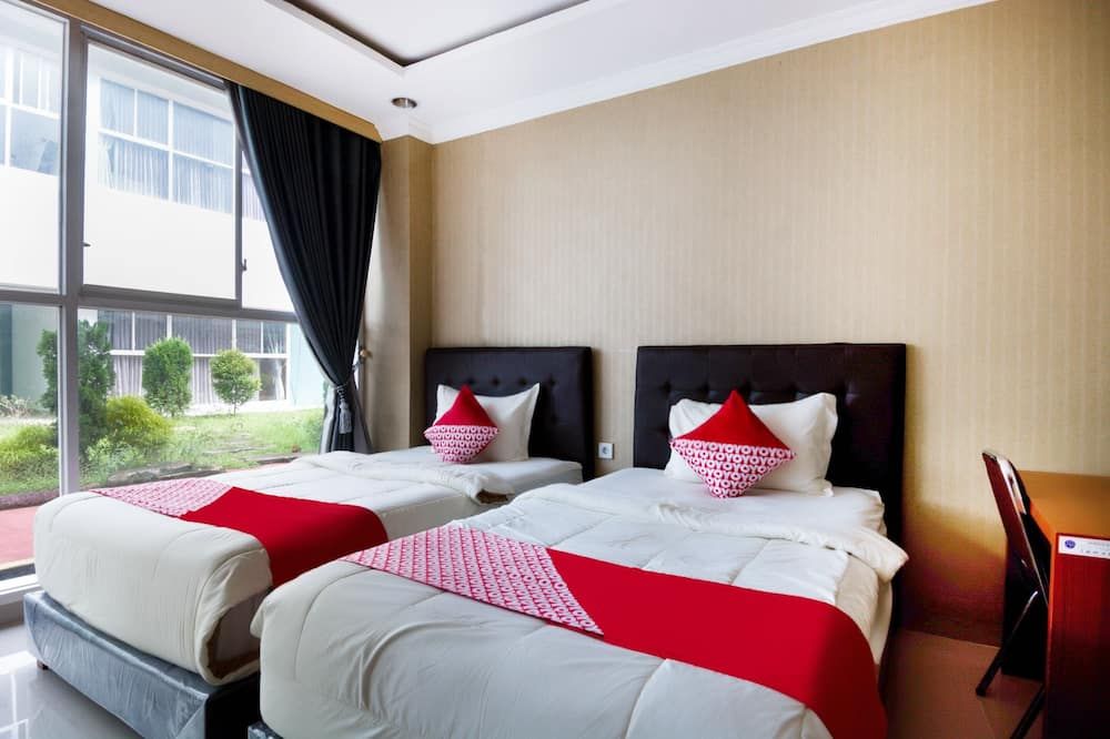 Collection O 3431 Hotel Alpha Bandara - פלמבאנג - חדר שינה