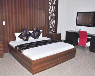 Charlie's Place and Suites - Lagos - Habitación