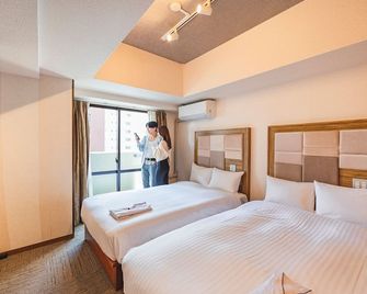 Hotel Relief Namba Daikokuchou - אוסקה - חדר שינה