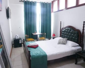 Happy Ours Guesthouse - Curepipe - Bedroom