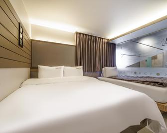 Busan Haeundae Hotel Foxy - Busán - Habitación