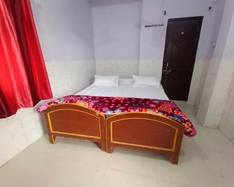 Hotel O Home Raghav Homestay - Faizābād - Habitación