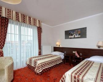 Hotel Zubrowka Spa & Wellness - Bialowieza - Schlafzimmer