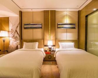 Dongsheng Jiuzhou International Hotel - Shennongjia - Habitación