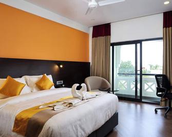 Astoria Hotels by Sparsa - Madurai - Bedroom