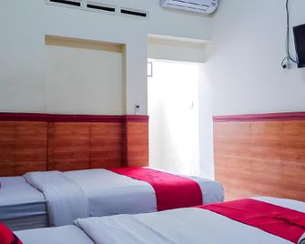 RedDoorz Syariah at Griya Soeratin Pacitan - Pacitan - Habitación