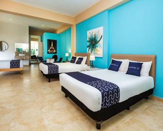 Capital O Cancun International Airport 24/7 - Cancún - Habitación