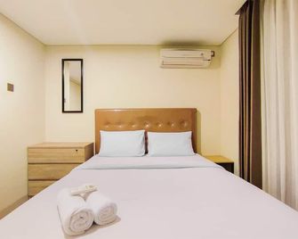 New and Nice 2BR at Marquis De Lafayette Apartment By Travelio - Semarang - Bedroom