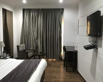 Hotel Orchid - Faridabad - Bedroom