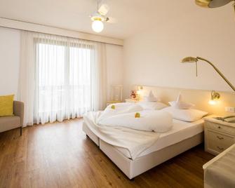 Pension An Der Linde - לאגונדו - חדר שינה