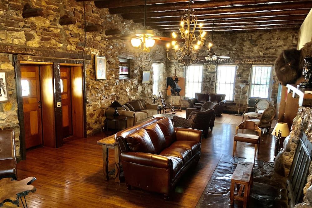 Lounge view of 1928 Historic Dude Ranch Stone Lodge Home