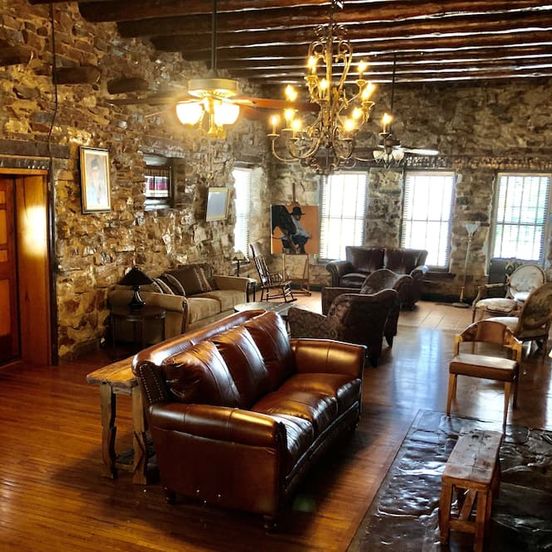 Lounge view of 1928 Historic Dude Ranch Stone Lodge Home