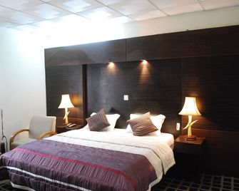 Citilodge Hotel - Lagos - Schlafzimmer