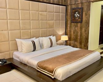 Royal Inn Hotel - קראכי - חדר שינה