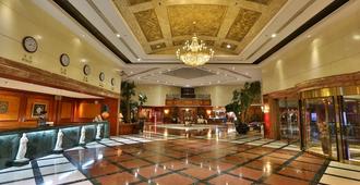 Huiquan Dynasty Hotel - Qingdao - Lobby