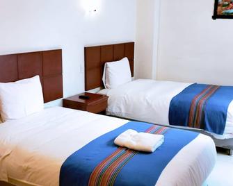 أكوا هوتل كوسكو - كوسكو - غرفة نوم