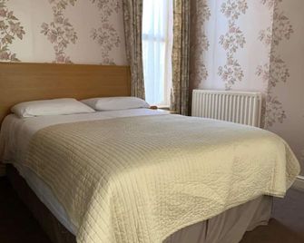 Waterford Lodge Hotel - מורפת' - חדר שינה