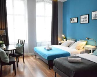 Blooms Inn & Apartments - Poznan - Yatak Odası