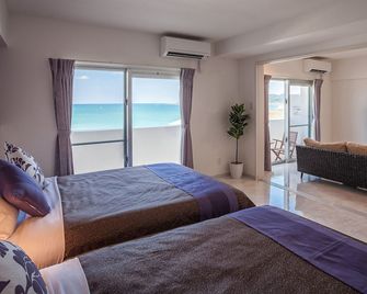 Yonabaru Hotel Sunrize Ocean - Yonabaru - Спальня