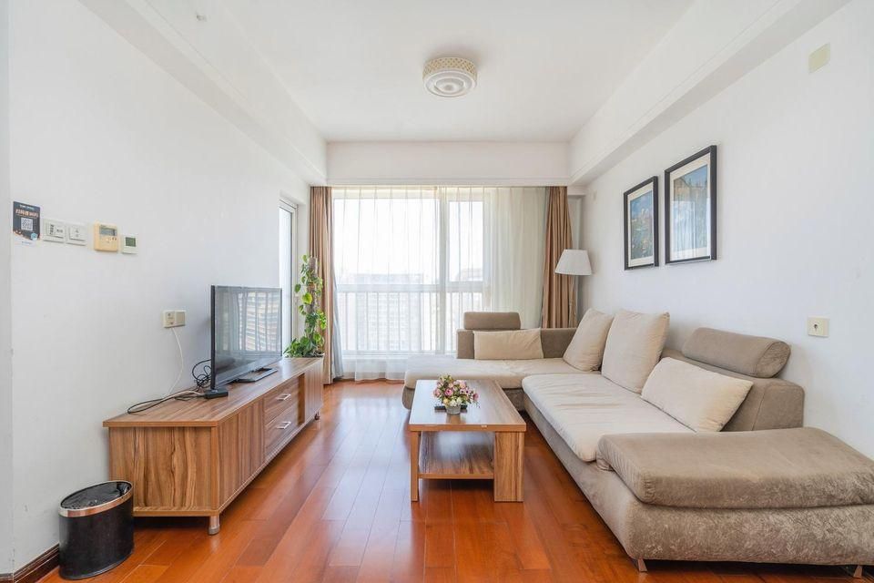 Qingdao Guyuanqing Apartment Hotel - تشينغداو - غرفة نوم