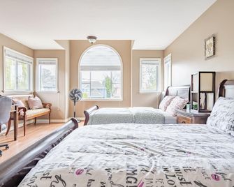 Fraser River Richmond Bed & Breakfast - ריצ'מונד - חדר שינה