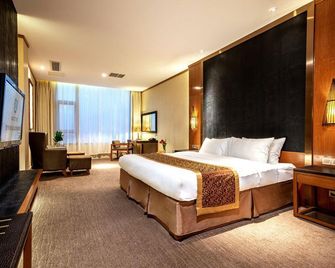 Ziqing Lake Hot Spring Holiday Hotel - Zhenjiang - Habitación