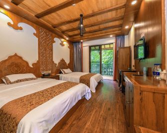 Shanshuijian Inn - Xishuangbanna - Habitación