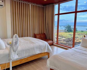 Melaka Ho Tram-Beachside Bungalows & Natureretreat - Xuyen Moc - Slaapkamer