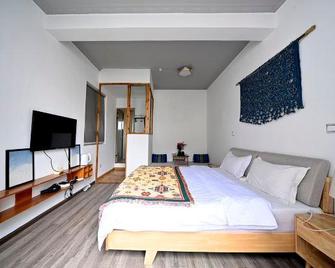 Dali Blue Bird Nest Guest House - Dali - Yatak Odası