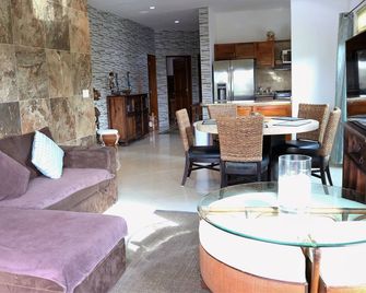Condo Bellmare B2 Bedroom Water front lagoon 3 steps to Pool.1 Min.from beach - Puerto Aventuras - Dining room