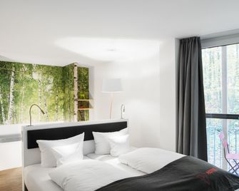 V-Hotel - בון - חדר שינה