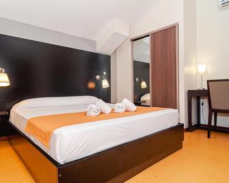 Tama Hotel - Saint-Paul - Bedroom