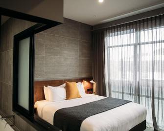 King and Queen Hotel Suites - นิว พลีมัท - ห้องนอน