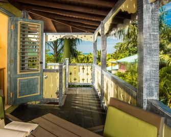 Country Country Beach Cottages - Negril - Balcón