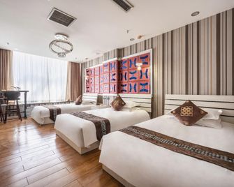 Jinxiu Jinhua Hotel - Turfán - Habitación