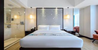 Foshan Rezen Select Pasonda Hotel - פושאן - חדר שינה