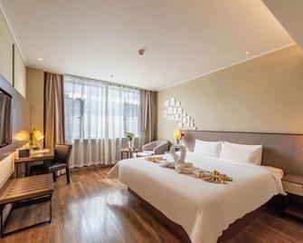 Home Inn Plus Dalian Development Zone Wanda Plaza Jinma Road - Dalian - Slaapkamer