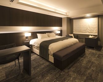 Hotel Granbinario Komatsu - קומאטסו - חדר שינה
