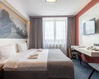 Terminal Hotel - ורוצלב - חדר שינה