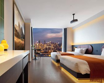 Mcsrh Hotel-Chongqing Jiefangbei Hongyadon - צ'ונגקינג - חדר שינה