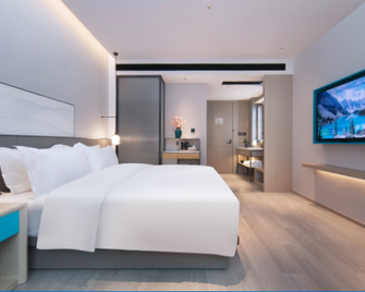 Wassim Hotel Wuhan Tianhe Airport Aviation Headquarters Metro Station - Wuhan - Soveværelse