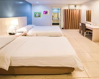 L'Fisher Ecotel - Bacolod - Ložnice