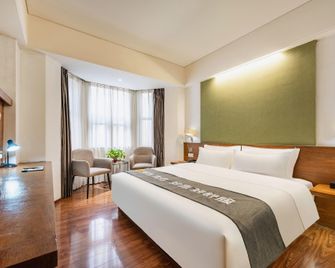 Pesht Hotel - Baoji - Schlafzimmer