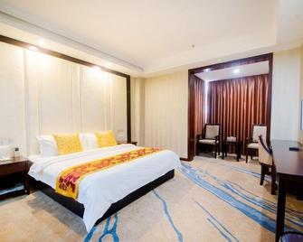 Huanggang Delphi Sanqing Business Hotel - Huanggang - Living room
