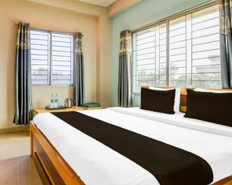 Super Collection O Sf Road Siliguri Formerly Jyoti Hotel - Siliguri - Makuuhuone