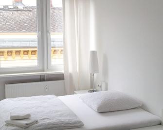 Business Hostel Wiesbaden One - ויסבאדן - חדר שינה