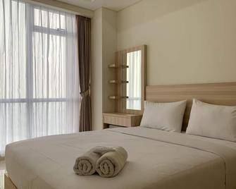 Cozy And High Floor 1Br At Sedayu City Suites Kelapa Gading Apartment - Yakarta - Habitación