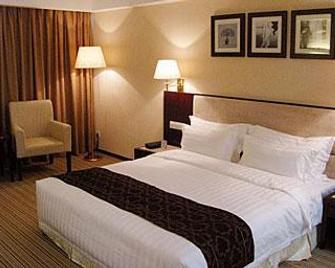 Grand Inn Zhuhai - Zhuhai - Bedroom